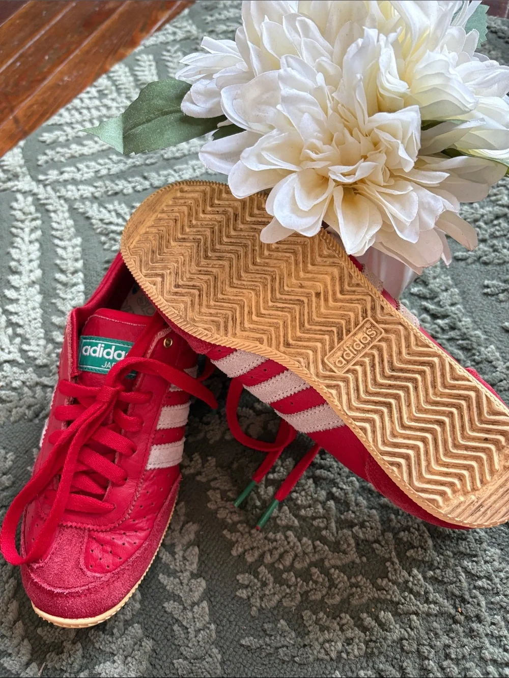 adidas women’s Red Sneakers with White Stripes